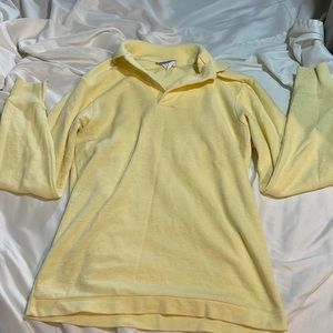yellow collared shirt